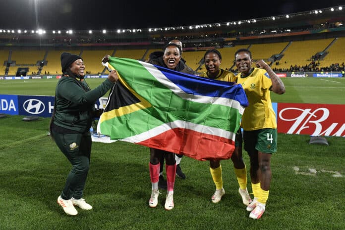 Banyana Banyana celebrate with the South African flag Banyana Banyana celebrate with the South African flag